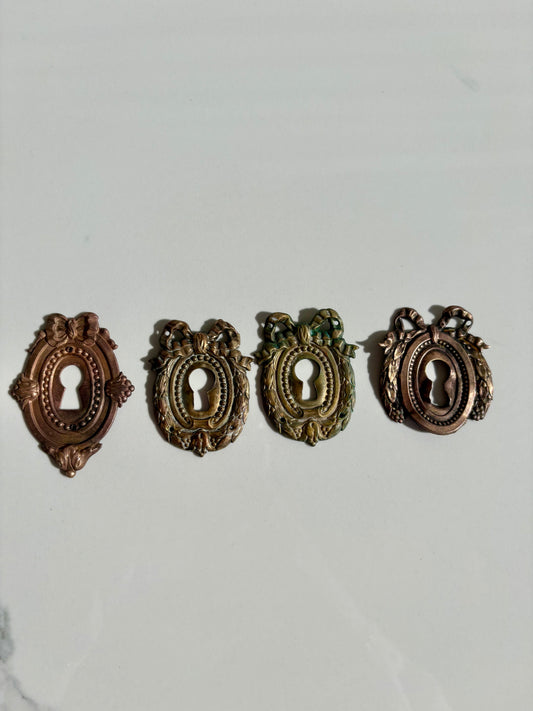 Bow Escutcheons